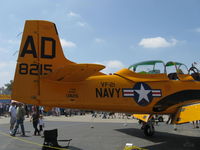 N7044L @ CMA - 1955 North American T-28B TROJAN 'Susy Q', Wright R-1820-86 9 cylinder Cyclone 1,425 Hp, the USN B model doesn't have a tailhook-the T-28C model has a tailhook for aircraft carrier practice - by Doug Robertson