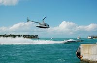 N3112T - Boat No. 15 Rio Roses and 2006 Robinson R44 Chase Helicopter in the Poker Run at Key West, FL - by scotch-canadian