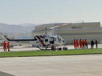 N305SB @ SBD - Crew waiting for crew members who secured the main rotor - by Helicopterfriend