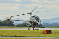 G-DCBI @ EGGP - Maneuvering back towards General Aviation post flight. - by Mark J Kopczewski