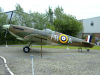 R6690 @ EGYK - Spitfire 1A Replica painted in 609Sqn markings
seen here on display at the Yorkshire air museum,Elvington - by Mike stanners