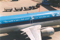PH-BDC @ EHAM - KLM ; Spcl title : The world is just a click away  
www.klm.com - by Henk Geerlings