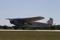 N8407 @ KGBG - Ford 4-AT-E - by Mark Pasqualino