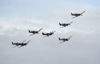 G-SPIT @ EGSU - IN FORMATION ON A DULL AND RAINY AFTERNOON AT DUXFORD - by Martin Browne