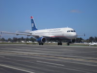 N605AW @ KSNA - Taxiing to the terminal - by Nick Taylor Photography