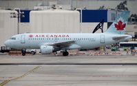 C-GARG @ KLAX - Air Canada A319 taxiing to Terminal 2 - by cx880jon