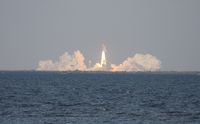 OV-103 - Space Shuttle Discovery taken from Titusville across the Indian River - by Daniel Compton