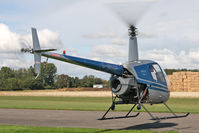 G-BSGF @ EGBR - Robinson R22 Beta at Breighton Airfield's Helicopter Fly-In, September 2011. - by Malcolm Clarke