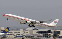 B-6052 @ KLAX - Departing LAX - by Todd Royer