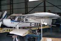 G-BRPE @ EGNH - inside the packed Blackpool Air Centre hangar - by Chris Hall