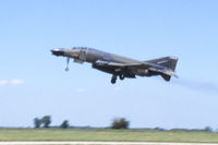 66-7690 @ KARR - Low speed pass over runway 27.  Unfortunate blur, but they are the only shots I have of this plane - by Glenn E. Chatfield