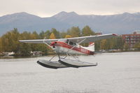 N8697X @ LHD - Departing from the Lake Spenard end of the Lake Hood Seaplane base Anchorage, AK - by BTBFlyboy