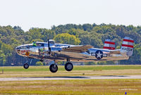 N9079Z @ KGED - Panchito takes off at Wings & Wheels Airshow KGED Oct. 2, 2010 - by M. Lee Derrickson