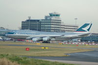 B-HKJ @ EGCC - Cathay Cacific Cargo Boeing 747 taxiing at Manchester Airport - by David Burrell