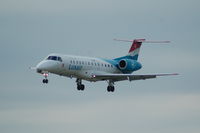 LX-LGK @ EGLC - Luxair Embraer 135LR on aprroach to London City Airport - by David Burrell