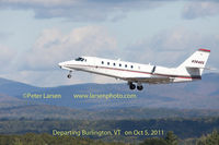 N364QS @ BTV - Departing BTV Oct 5, 2011. Taken with 21MP 5D2 camera, 400/f2.8 lens and 1.4X TC - by Peter Larsen