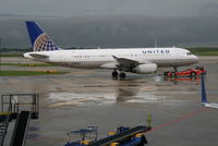 N409UA @ KORD - Pulled to the gate