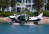 N719MS - Cessna 208 on Lake Charlevoix - by Florida Metal