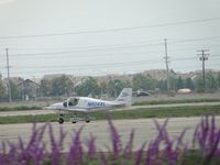 N604XL @ CNO - Taxiing eastbound south of the tower - by Helicopterfriend