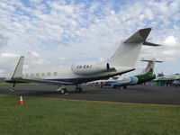 XA-EAJ @ NVVV - Parked at NVVV Port Vila Vanuatu 
 with the Air Vanuatu ATR72 Just squeesing past - by Tony Deamer