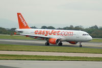 G-EZUE @ EGCC - Easyjet Airbus A320-214 taxiing. - by David Burrell