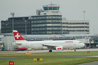 HB-IJD @ EGCC - Swiss Airbus A320-214 taxiing Manchester - by David Burrell