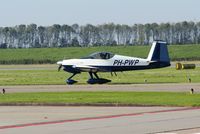 PH-PWP @ EHLE - Heading for the runway at Lelystad Airport. - by Jan Bekker