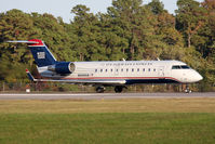 N449AW @ ORF - US Airways Express N449AW (FLT AWI3673) on takeoff roll on RWY 23 en route to Charlotte/Douglas Int'l (KCLT). - by Dean Heald
