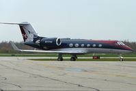 N777KK @ CYKF - Striking livery on this Gulfstream Aerospace G-IV, c/n: 1429 at Region of Waterloo , Ontario - by Terry Fletcher