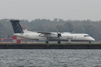 C-GKQB @ CYTZ - 2011 Dehavilland DHC-8-402, c/n: 4359 of Porter Airlines - by Terry Fletcher