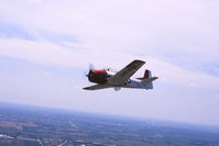 N303NA - Flying over the Chicago area, seen from the turret position of a TBM-3