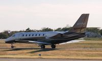 N777UT @ KAXN - Cessna 680 Citation Sovereign taxiing to runway 31. - by Kreg Anderson