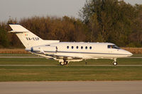 XA-ESP @ KDPA - Taxiing to the ramp - by John Meneely