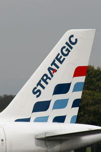 LX-STC @ EGCC - Strategic Airlines - by Chris Hall
