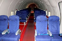 G-APSA @ EGBE - Seating layout in a DC-6A At Airbase Museum at Coventry Airport - by Terry Fletcher