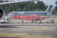 N99800 @ OPF - Beech H18 behind a couple of fences - by Florida Metal