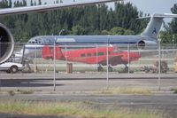 N99800 @ OPF - Beech H18 behind a couple of fences - by Daniel Compton
