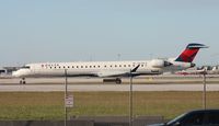 N679CA @ MIA - Comair CRJ-900 - by Florida Metal
