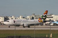 VP-CKZ @ MIA - Cayman 737 - by Florida Metal