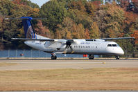 N341NG @ ORF - United Express (Colgan Air) N341NG (FLT CJC4906) on takeoff roll RWY 23 en route to Newark Liberty Int'l (KEWR).