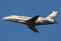 N212T @ LAX - AT&T Corporation's 1997 Dassault Falcon 2000 N212T climbing out from RWY 25R. - by Dean Heald