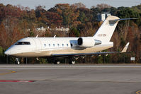 N597DA @ ORF - Delta Air Elite Business Jets 1997 Canadair CL600-2B16 Challenger 604 N597DA (Elite Jet 97) holding short of RWY 23 at Taxiway Foxtrot awaiting takeoff clearance for departure to Kinston Regional (KISO). - by Dean Heald