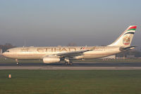 A6-EYI @ EGCC - Etihad Airways - by Chris Hall