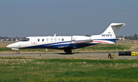 N610FX @ KCCR - Flexjets 2005 Learjet 45 @ Concord, CA taxis to RWY 1L for flight to KJAC (Jackson Hole, WY) - by Steve Nation