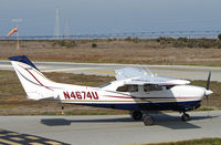 N4674U @ KPAO - Sacramento, CA-based 1983 Cessna T210N taxis for take-off on RWY 31 @ Palo Alto, CA - by Steve Nation