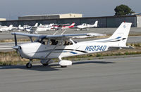 N6034D @ KSQL - Locally-based Diamond Air Ventures 2006 Cessna 172S taxis for another training go around to San Carlos, CA - by Steve Nation