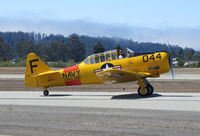 N7522U @ KWVI - 1952 CCF Harvard Mk IV painted as USN SNJ-5 BuAer 91044 F/044 Navy OAKLAND yellow cs & red band taxying @ Watsonville Fly-In - by Steve Nation
