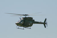 UNKNOWN @ 0TE2 - New Belll OH-58D at the main Bell Helicopter plant - Hurst, TX