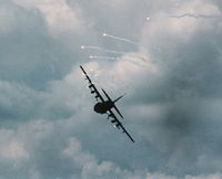 UNKNOWN @ DAY - AC-130 with flares - by Daniel Compton