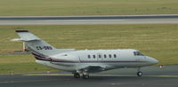 CS-DRU @ EDDL - Net Jets, is taxiing for departure at Düsseldorf Int´l (EDDL) - by A. Gendorf